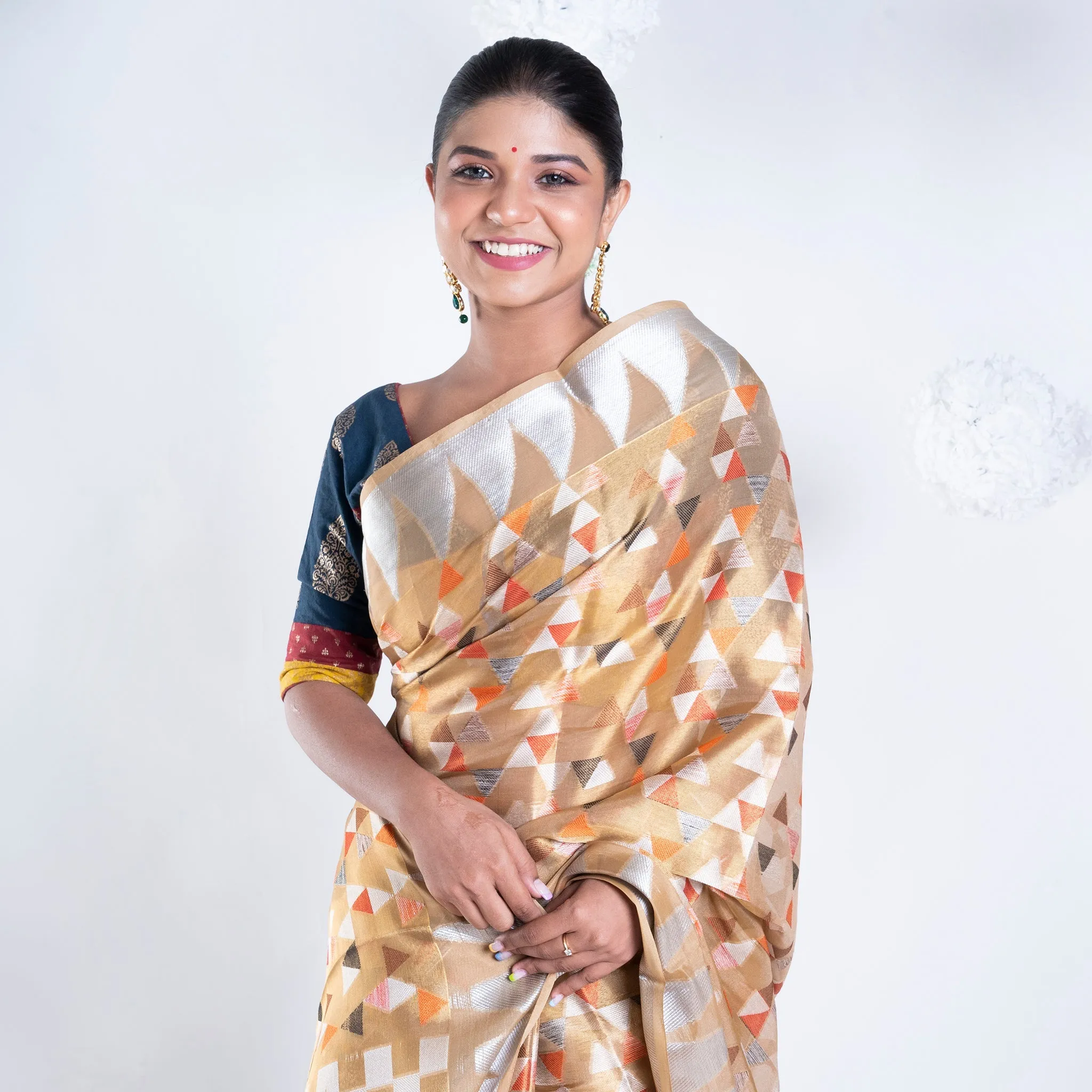 Women Banarasi Kora Organza Saree In Mud Yellow Color With Multicolor Motifs With Copper Zari