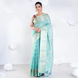 Women Banrasi Kora Organza Saree In Green Color With Multicolor Abstract Motifs And Zari Border